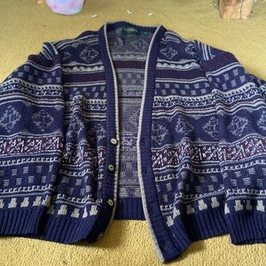 Patterned navy, maroon, and beige knitted cardigan.